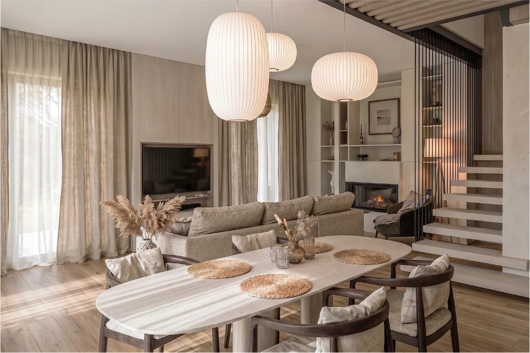 Soft daylight across sage cabinetry in the Leaf Mint apartment