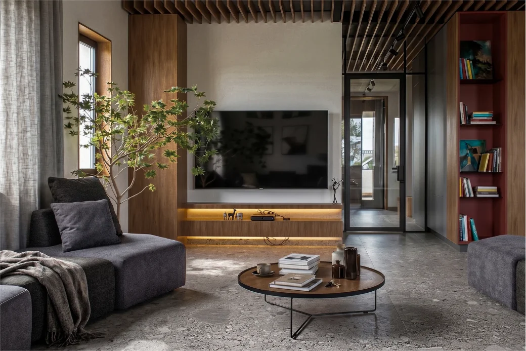 ORION — A colour-forward city apartment where rust, ink blue and oak are held together by a slatted ceiling that runs the length of the plan.